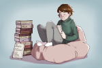 A copy of ‘101 Essays That Will Change The Way You Think being read by someone in a beanbag chair