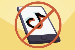 A phone with the TikTok app symbol on it, overlaid with a "no" sign