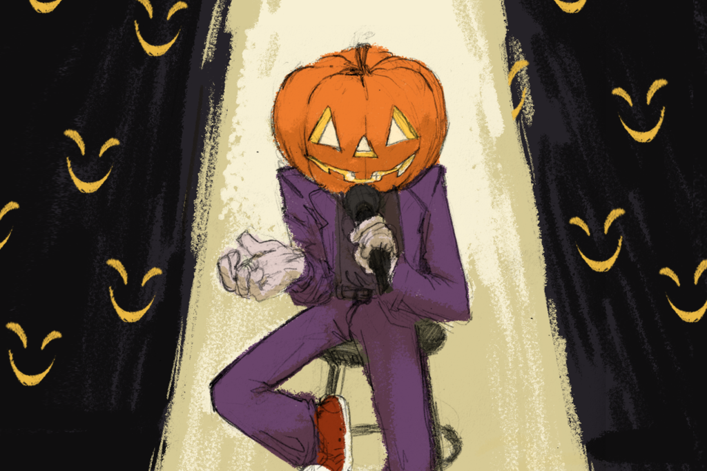 Man with pumpkin for head doing stand-up.