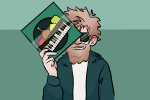 Jack Stauber posing with his album Pop Food