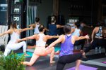 An article on CHAARG has a picture of women doing yoga together