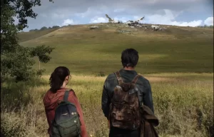 A screenshot of Pedro Pascal and Bella Ramsey playing Joel and Ellie in HBO's new show, The Last of Us