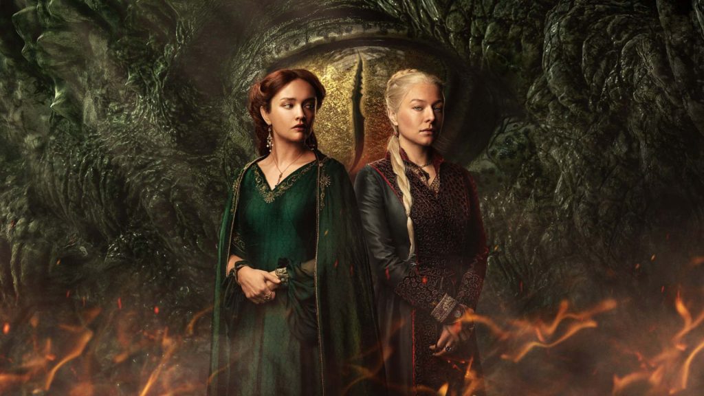 Rhaenyra Targaryen and Alicent Hightower posing in front of a dragon for the new show 'House of the Dragon'.