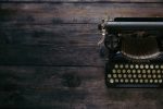 a black typewriter on a table