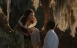 A movie still from "A Jazzman's Blues" where Bayou and Leanne gaze into each other's eyes.