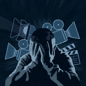 In an article about actor's mental health, an anonymous actor covers his face with his hands in distress.
