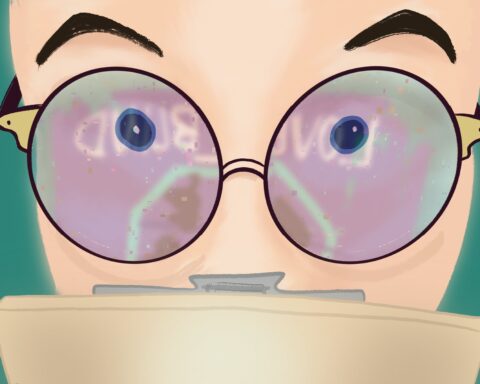 Person with colorful glasses behind a clipboard.