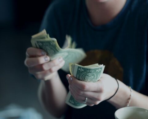 Woman counting money.
