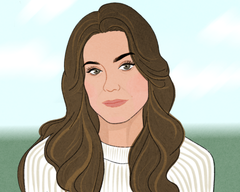 A woman with brown wavy hair sits in a ribbed white sweater against a blue cloudy sky and green grass background.