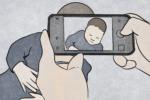 Someone taking a picture of their young child.