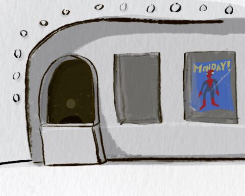 A white, baren wall and box office window with two rectangle postings. One window has. a photo of blue and red spiderman figure.
