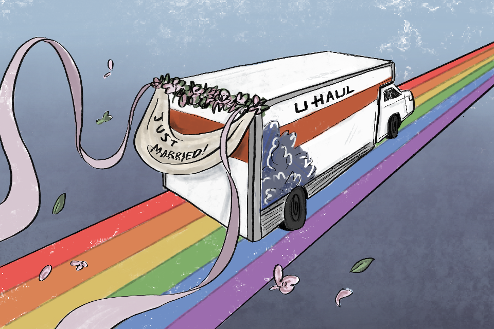 A white U HAUL truck with a red line struck through it and a blue bush drawn on it races across a rainbow, heading to who-knows-where. Pink silk streamers floats off the ends of a pink bouquet placed above a banner with "Just Hitched" written on it in black ink. The streamers flutter in the air against a grey background, implying the speed at which the vehicle must be racing.