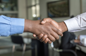 https://unsplash.com/photos/two-people-shaking-hands-n95VMLxqM2I